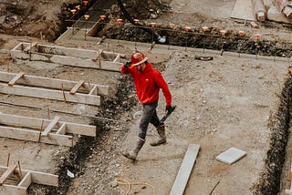 a busy construction worker running around