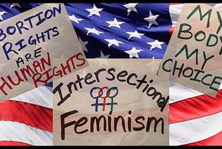 Abortion Rights and Intersectional Feminism signs in front of the American flag