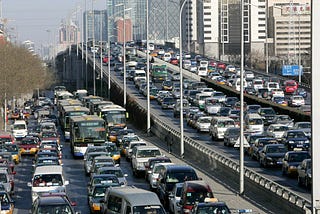 License Plate Lottery and the Global Implication of Traffic Jam