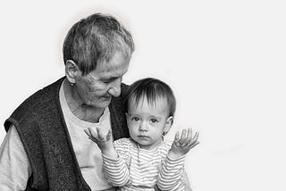 grandmother holding grandchild