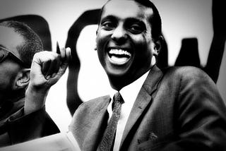Stokely Carmichael smiling.