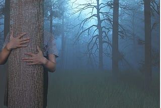 A figure is hiding behind a tree in a foggy forest.