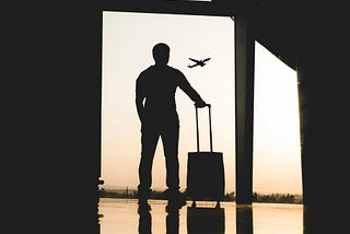 man waiting at the airport- shadows