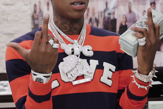 NBA YOUNGBOY BLESSES FAMILY WITH CHRISTMAS CASH BECAUSE THEY MADE HIM ‘HAPPY’