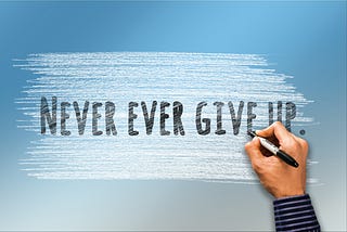 “Never Give Up”