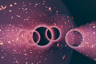 A series of glowing spheres overlap, projecting halos of pinkish light around themselves, flecked with bright spots like stars. The effect is to create a sense of ambiguity and uncertainty over what you are seeing.