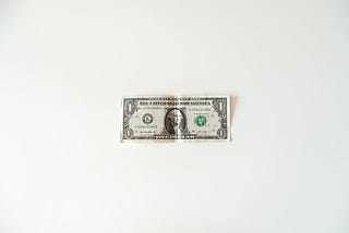 A single dollar bill.