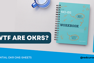A mockup of the No BS OKRs Workbook with a turquoise cover sits on a beige table next to a blue mug. The title on the graphic is “WTF are OKRs” with a subhead of “Essential OKR One-Sheets.”