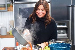 Rachel Rey cooking on Food Network with Joe Nilsen