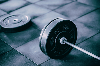 Gym weights on the ground.