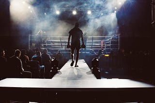 Fighter walking down runway to the boxing ring.