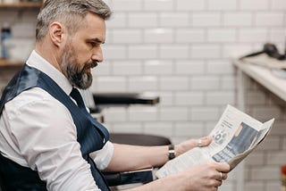 Man reading a newspaper