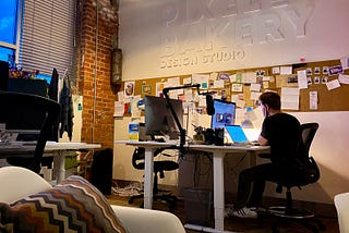 Jordan Lambrecht sitting at his desk at Pixel Bakery being very sleepy at 1:00am