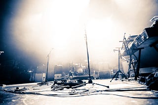 an empty stage waits for musicians