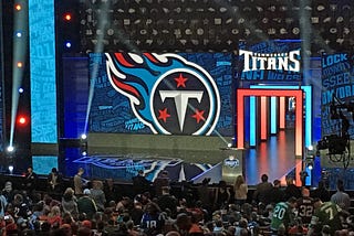 The stage at the NFL draft shows the Tennessee Titans preparing to make their selection.