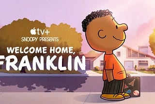 Franklin on the right of the picture is standing in the sunlight next to a sticker covered suitcase. on the left is the title of the special “Welcome Home, Franklin.”