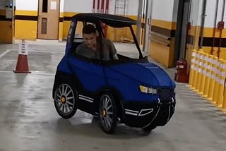 Navigating a parking structure in the small but nimble PodRide electric quadricycle.