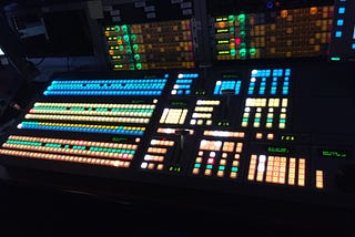 A control pannel with lots of lights and buttons