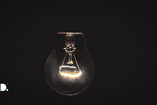Light bulb portrait on black background