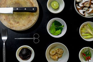 Cutlery and bowls with food