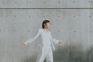 woman in white suite