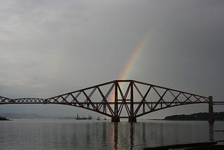 The Forth Rail Bridge and a rainbow.