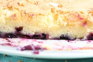 a piece of lemon-blueberry cake on a plate