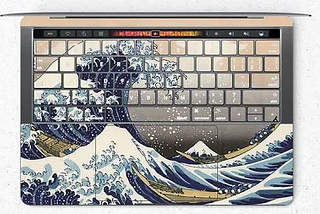 Computer with “Great Wave off Kanagawa” on keyboard