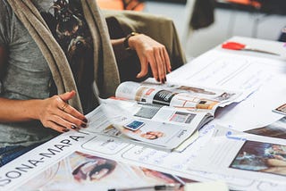 Woman paging through a magazine