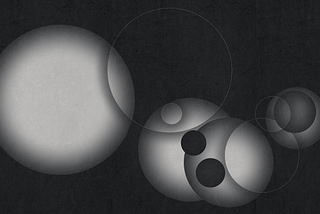 A collection of circles and spheres in different shapes and sizes, overlapping at certain points, yet all of them going in their own directions.