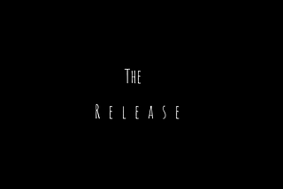 Black background. White text in the middle of the page: “The Release”.