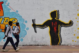 In June 2025, Bangladesh’s International Crimes Tribunal (ICT) began proceedings against former Prime Minister Sheikh Hasina over alleged crimes in the July–August 2024 uprising. What began as a public reckoning soon sparked debate over whether this is fair justice — or a political spectacle. With the chief prosecutor, once a defense lawyer for accused war criminals, openly calling the trial “a pledge for the future,” questions loom over process, impartiality, and democratic impact.