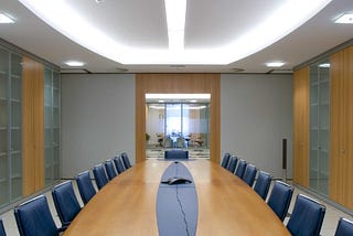 A conference room with a new boardroom table