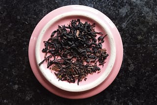 Tea leaves mixed in a ceramic plate