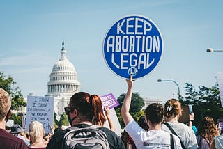 Abortion rights protest in Washington DC, US — protest sign reads “KEEP ABORTION LEGAL”