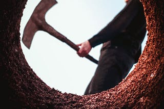 Man digging a hole for himself.