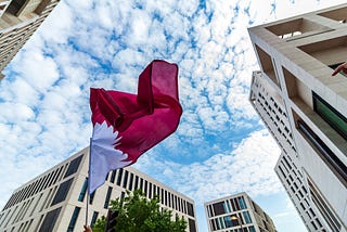 Qatari flag waving