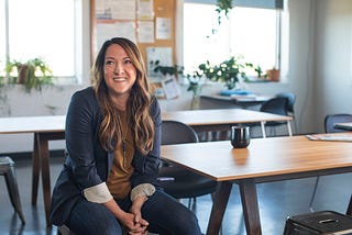 woman smiling in a cafe coffee shop