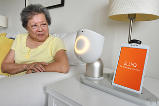 older adult using ElliQ