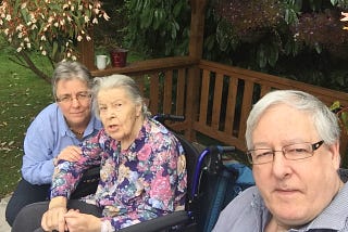 Far Left Rosie my Sister, and me David visiting Jeanne centre in the Garden at Shelton Lock Nursing Home, Derby