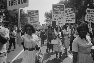 Young black people march for civil rights in historic photo