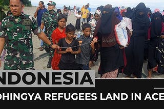 Anti-Rohingya protesters storm Indonesia refugee shelter demanding deportation