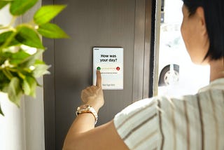 A woman completing a survey on an interface.