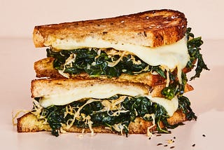 Kale Reuben from Bon Appetit. Toasted sandwich with melted cheese, sauteed kale, and sourkraut.