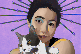 A person with short dark hair and light skin is holding a grey and white cat against a purple background.