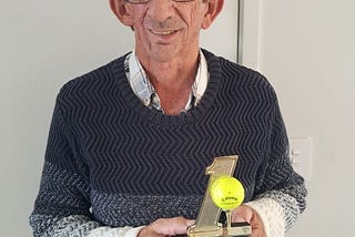 Author with his hole-in-one memento