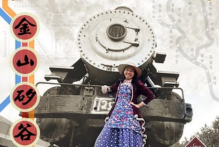 Photo of Alfred in a prairie dress and apron, standing in front of an old steam locomotive. In the background are a street map made up of streets from various Chinatowns and Asian American neighborhoods and a railway map of California cities with Chinese names.