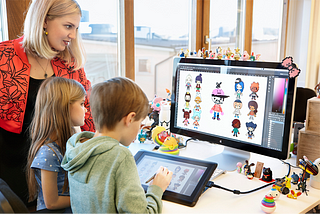 Children designing characters at Toca-Boca Studio.