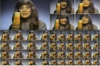 Screen capture of commercial with matrix of women and shampoo