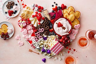 Image of a charcuterie board in the shape of a heart.
